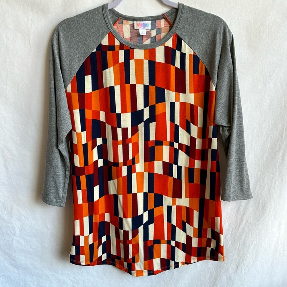 LuLaRoe geometric print raglan sleeve top, size L